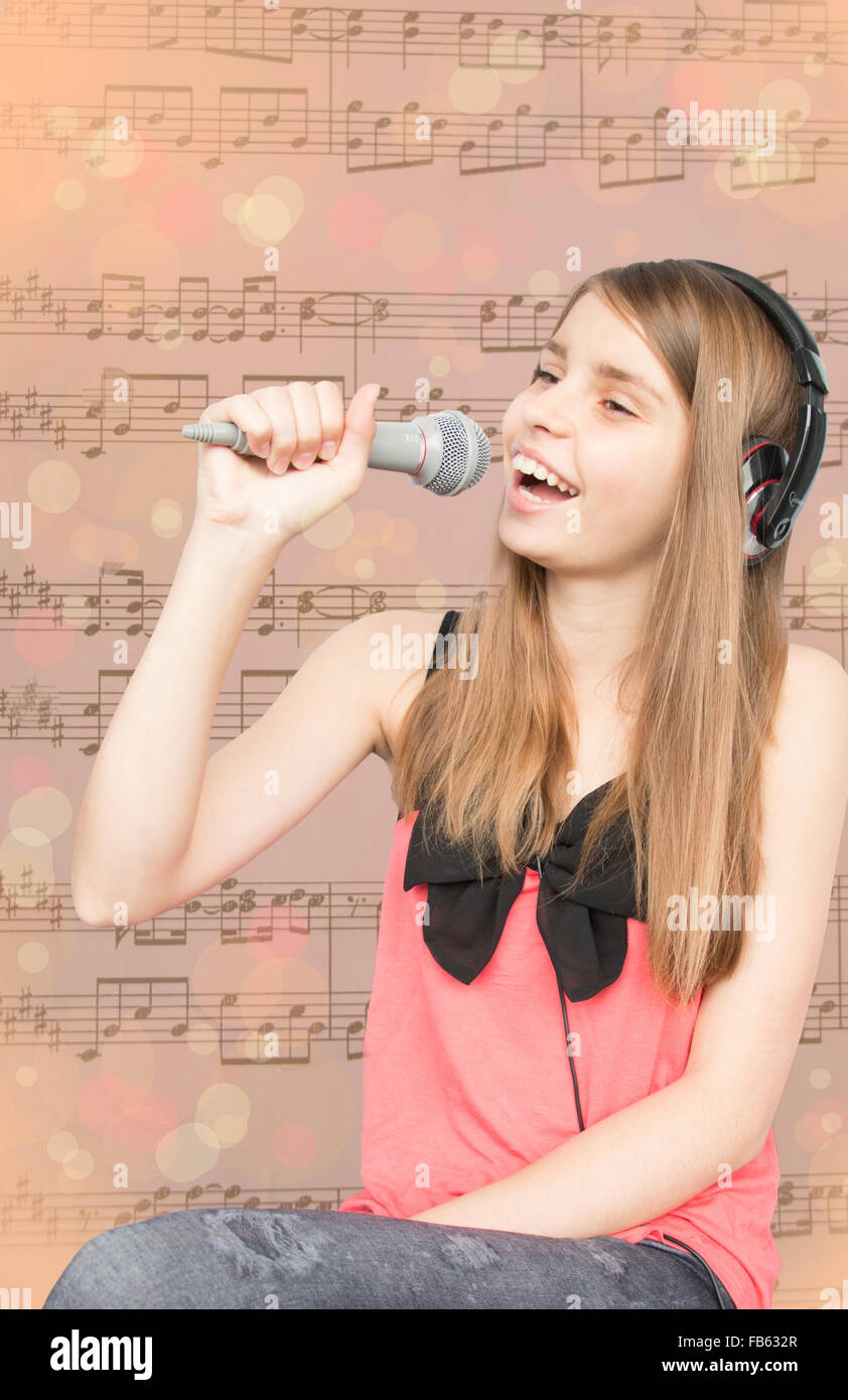 Young beautiful teenage girl singing Stock Photo Alamy