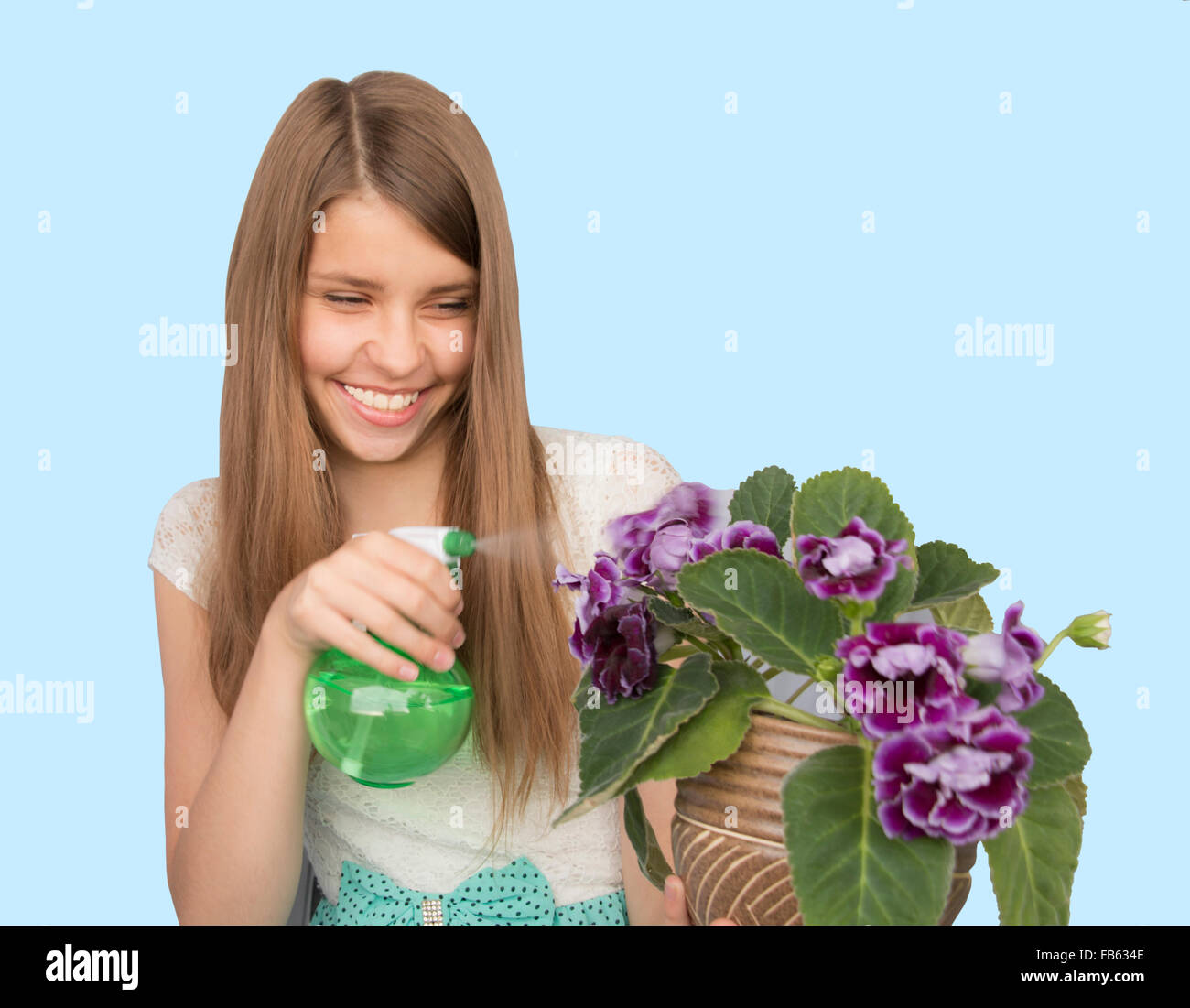 Portrait teenage girl with flower pot Stock Photo - Alamy