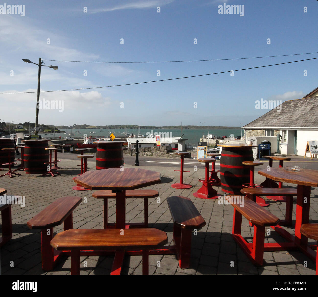A view from Bushe's Bar at The Waterfront in Baltimore across the harbour towards Sherkin Island. Stock Photo