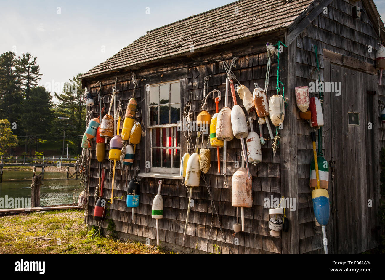 Vintage storage lobster shack with fishing buoys, Bar Harbor, York, Maine, USA, New England, old