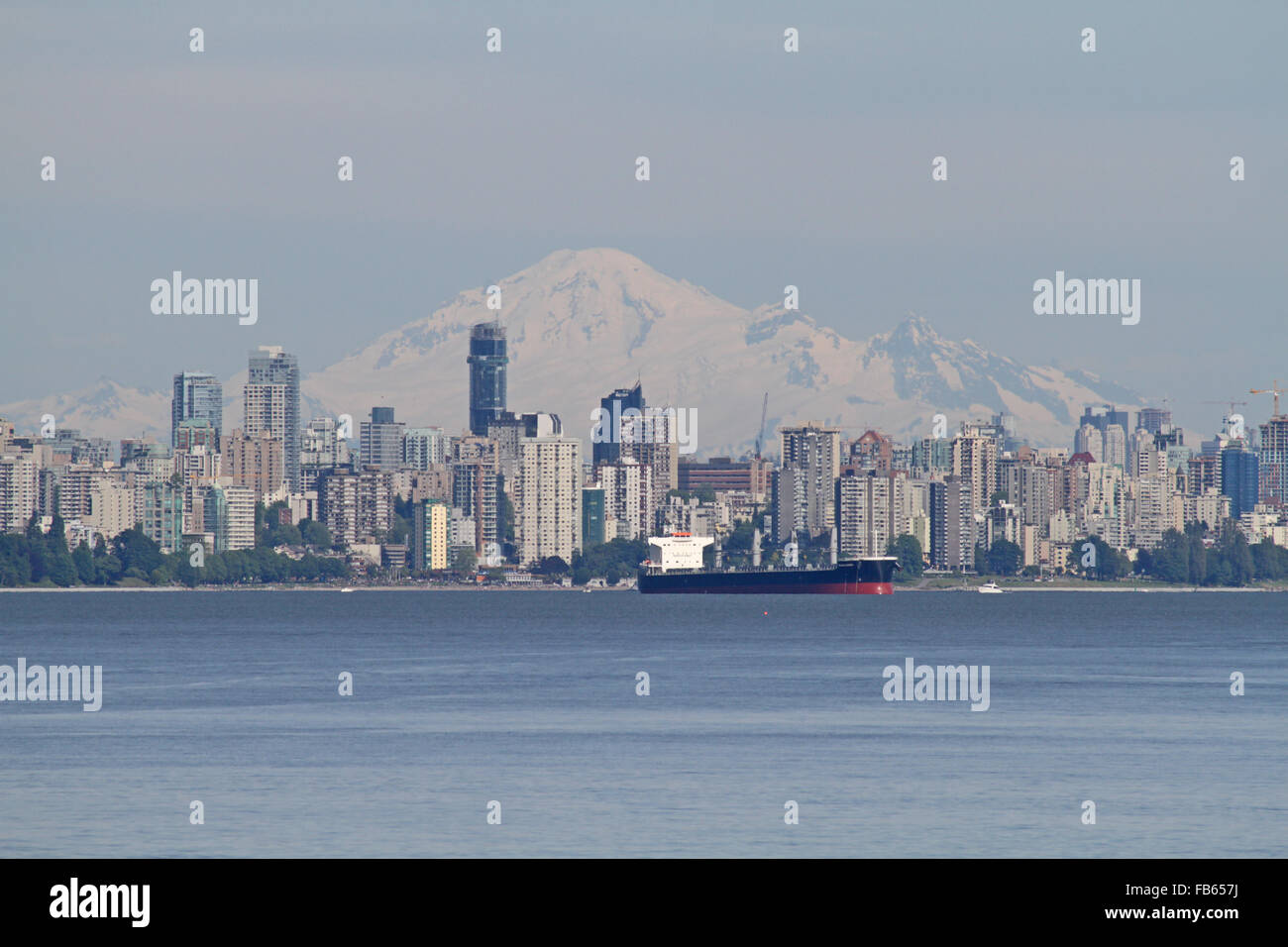 The Vancouver skyline with Mount Baker in the background, viewed from Lighthouse Park. British Columbia, BC, Canada Stock Photo