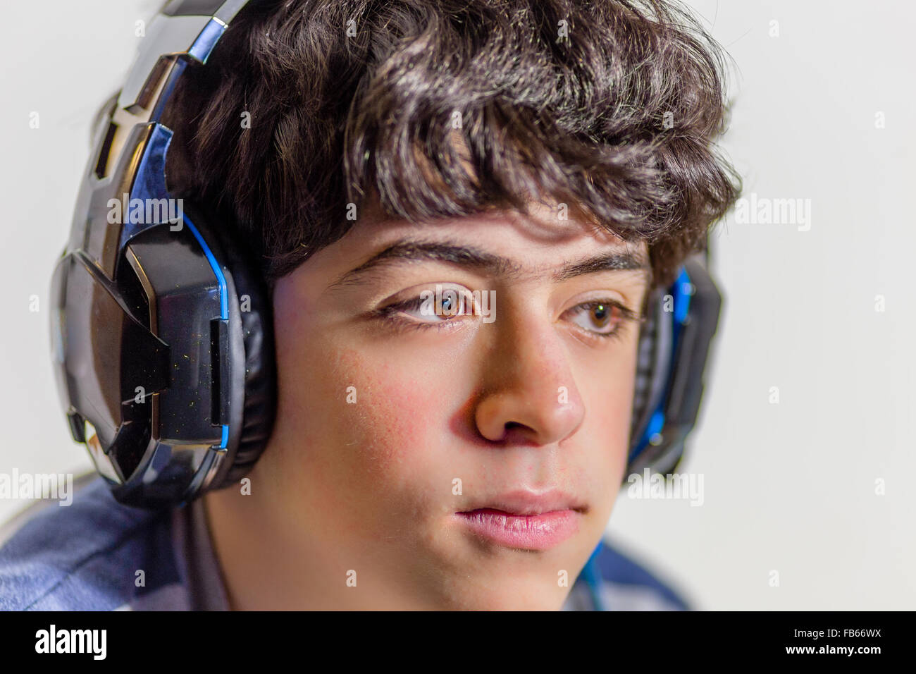 Boy wearing headphones gaming hi-res stock photography and images - Alamy