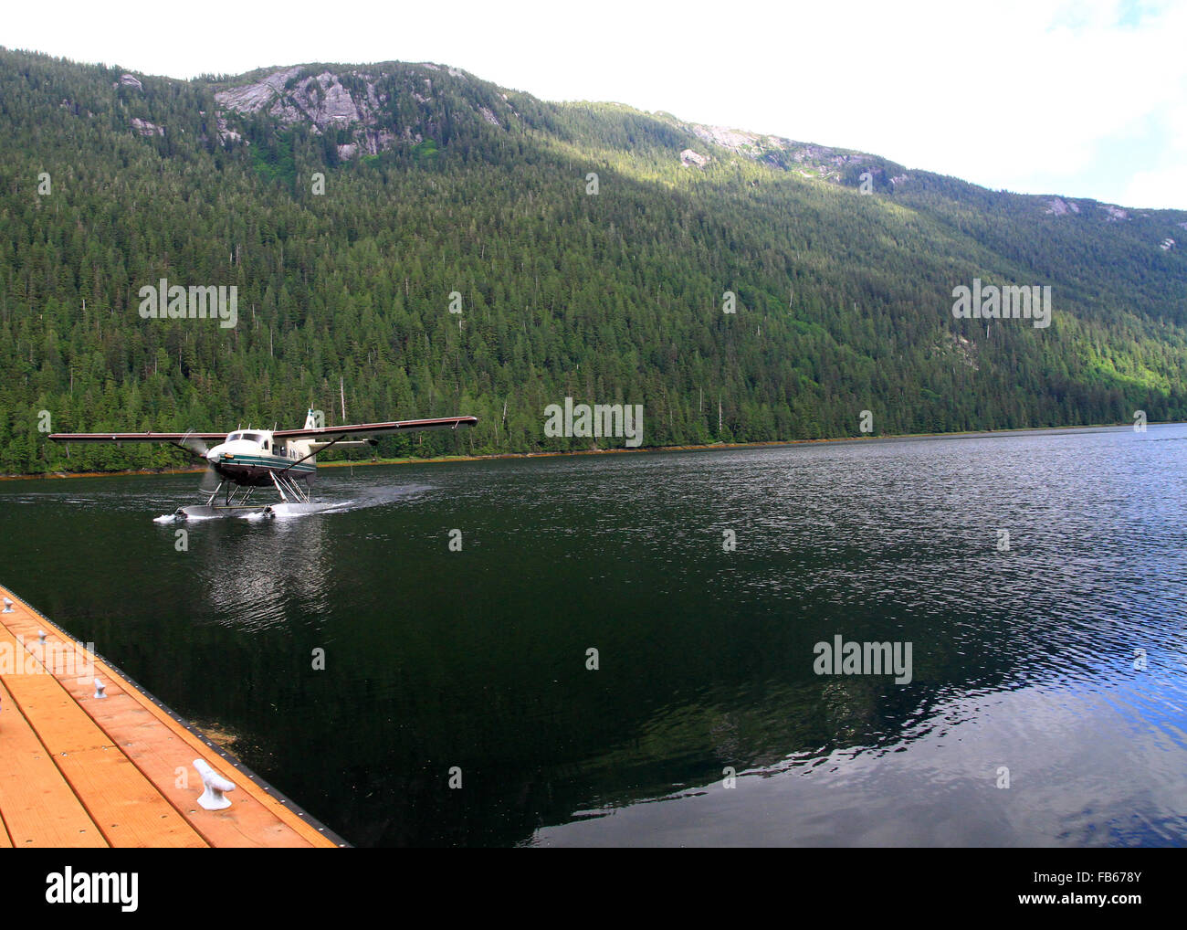 Floatplane landing in Rudyerd Bay in the Misty Fjords near Ketchikan, Alaska Stock Photo