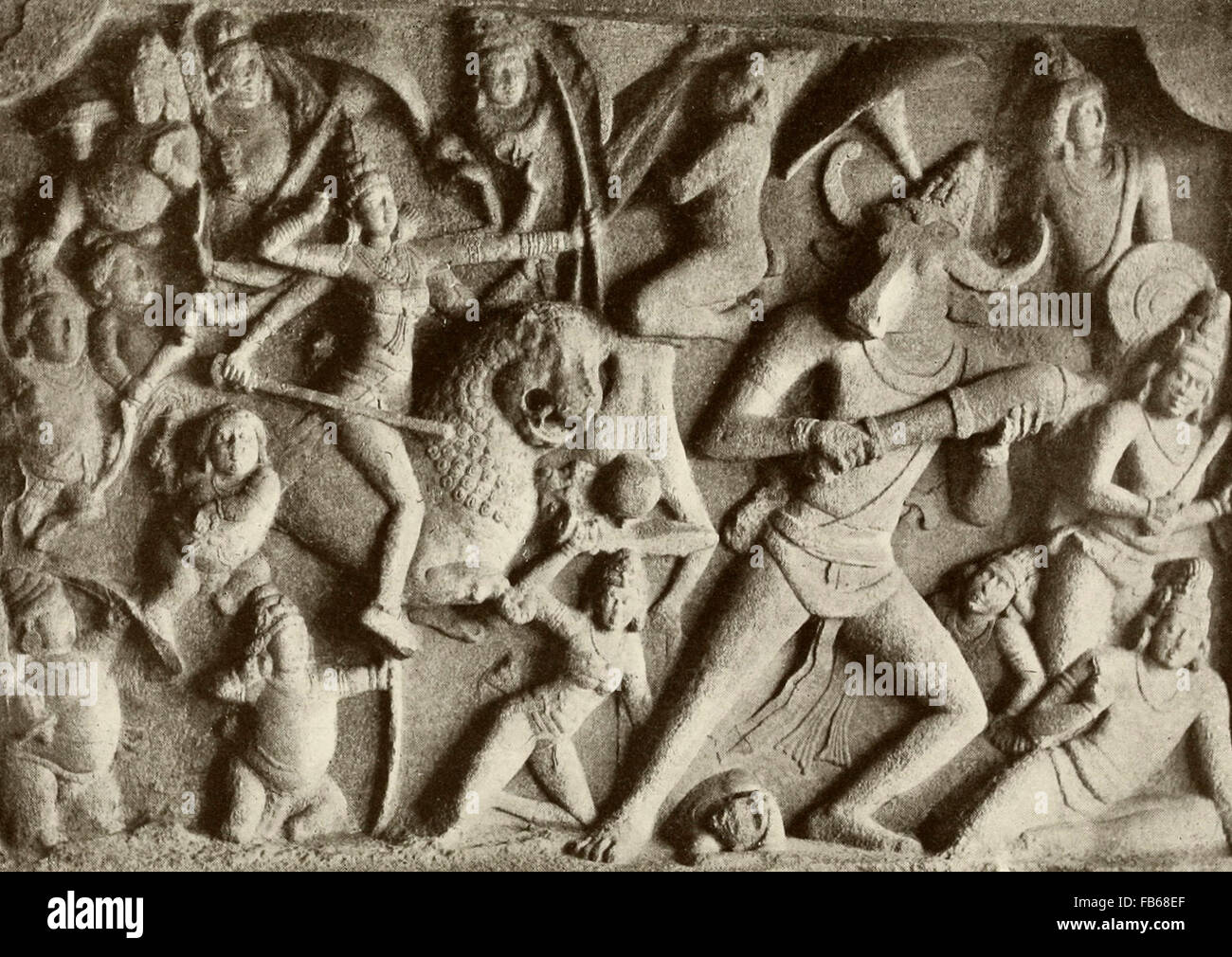 Durga Slaying dragons and demons - Mother Goddess in Hinduism Stock Photo