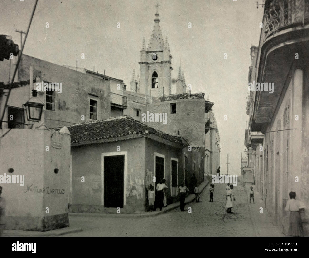 A typical Havana, Cuba Street - Christ Church in background, circa 1910 Stock Photo