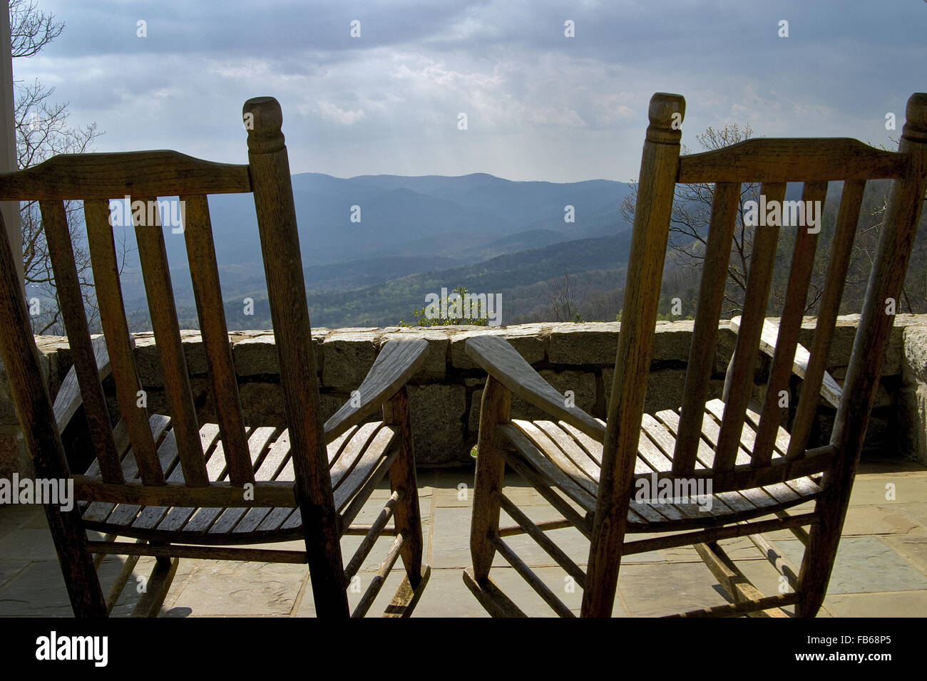 Rocking chairs set on a porch overlooking the Blue Ridge Mountains at Amicalola Falls State Park, Georgia, USA. Stock Photo