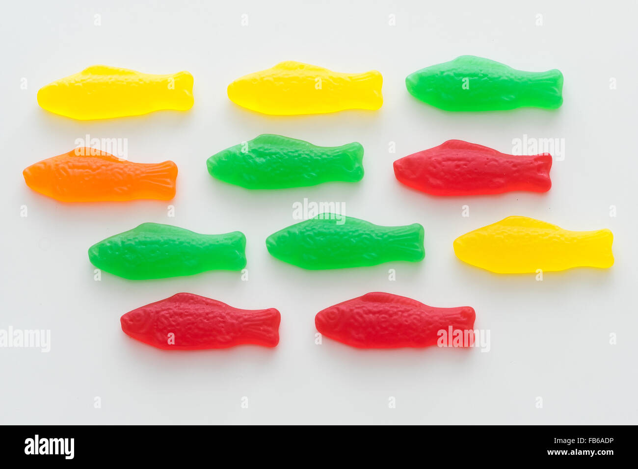 A closeup of Swedish Fish, a fishshaped chewy candy originally