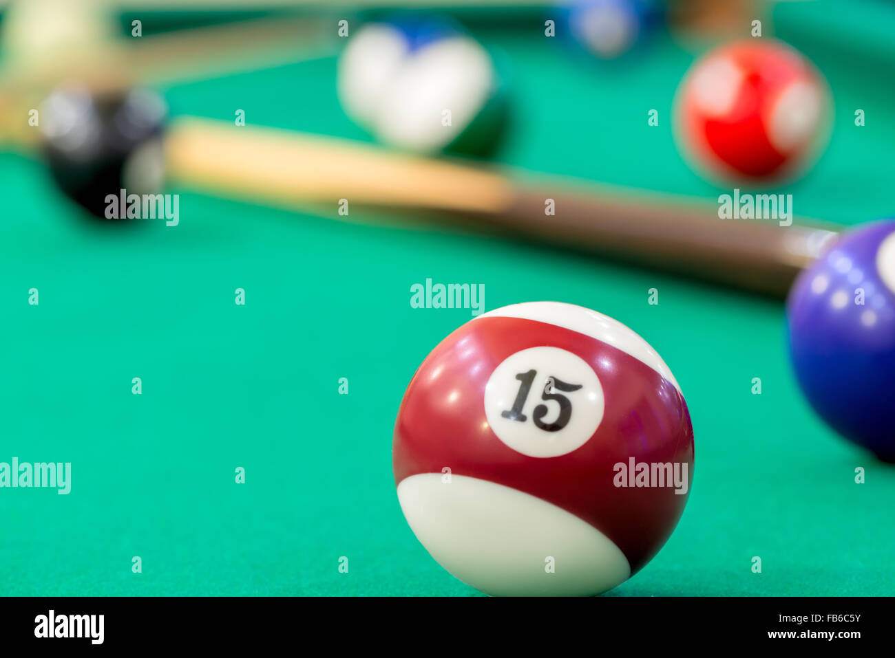 ball number 15 on the table of billiard close-up Stock Photo - Alamy