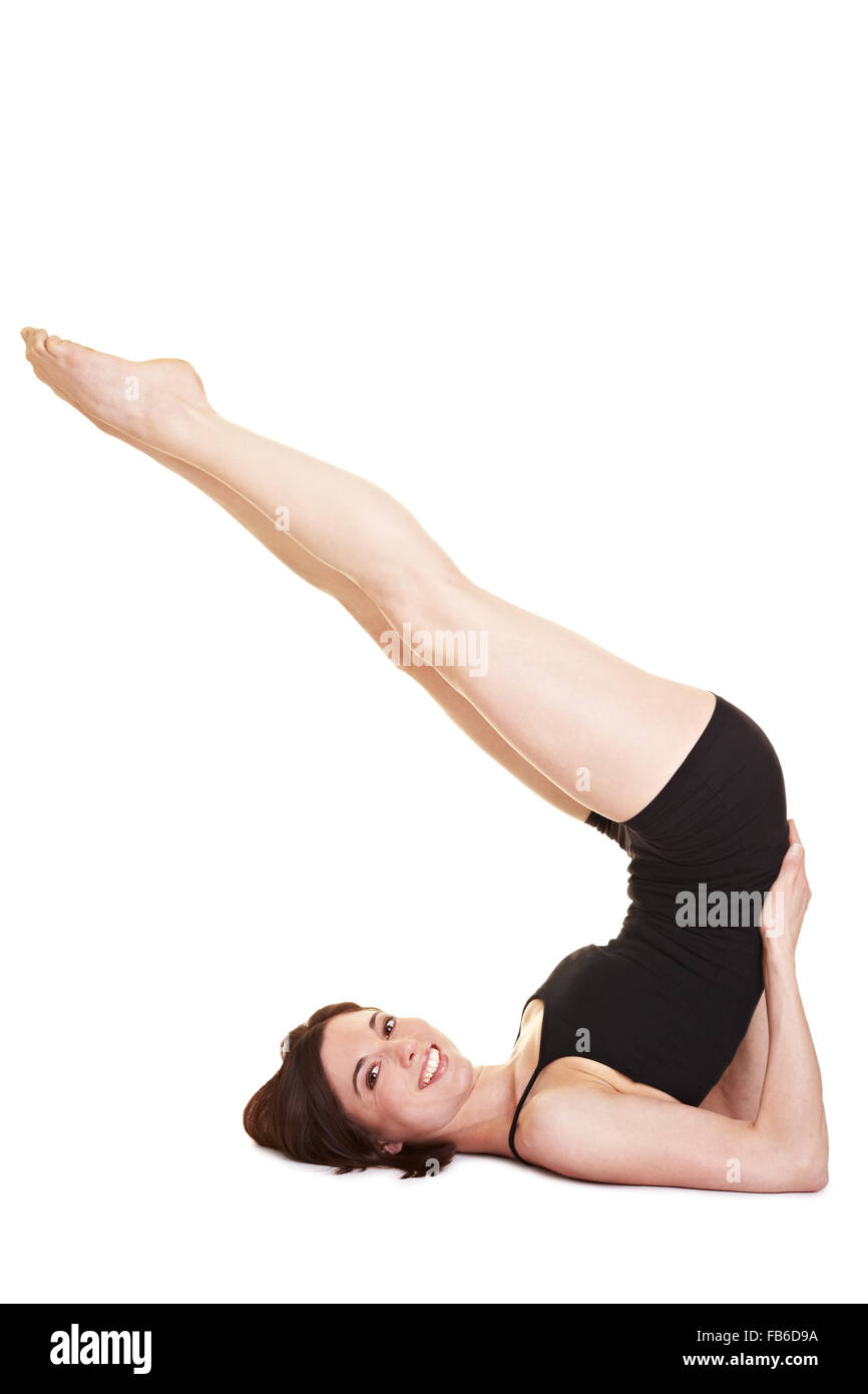 Flexible woman doing back exercises in shoulder stand Stock Photo Alamy