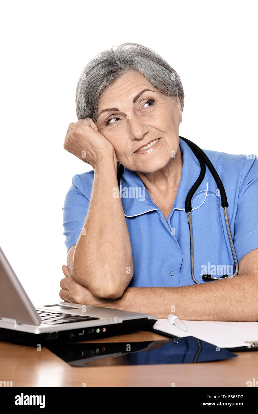 Thoughtful senior doctor Stock Photo - Alamy