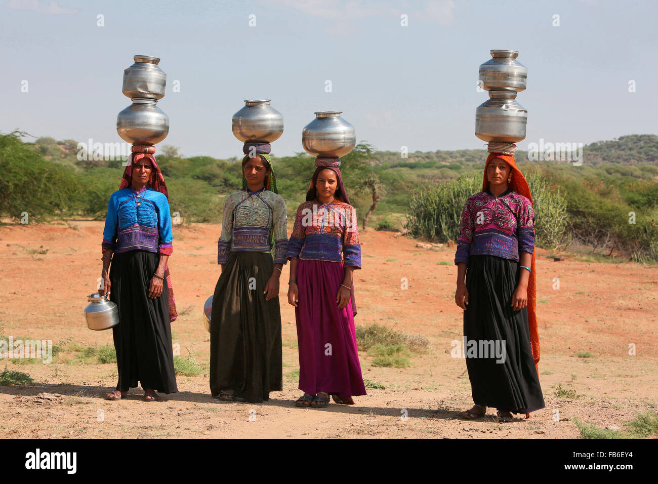 Dhebaria Rabari, Woman carrying water pots, Kutch District, Gujarat, India Stock Photo