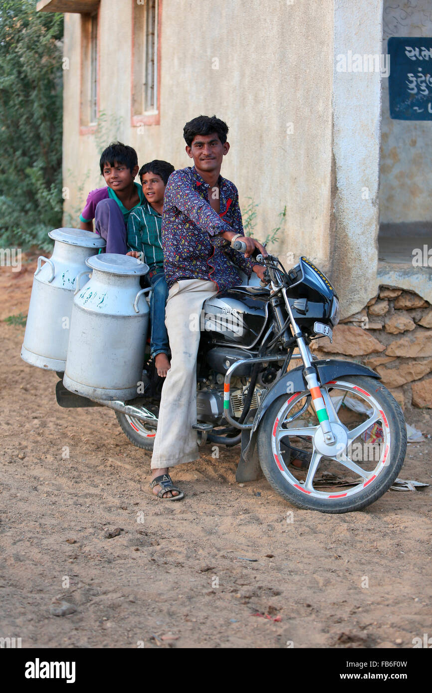 Kacchi Rabari (Desi), Laharia Village, Man with milk container, Kutch District, Gujarat, India Stock Photo