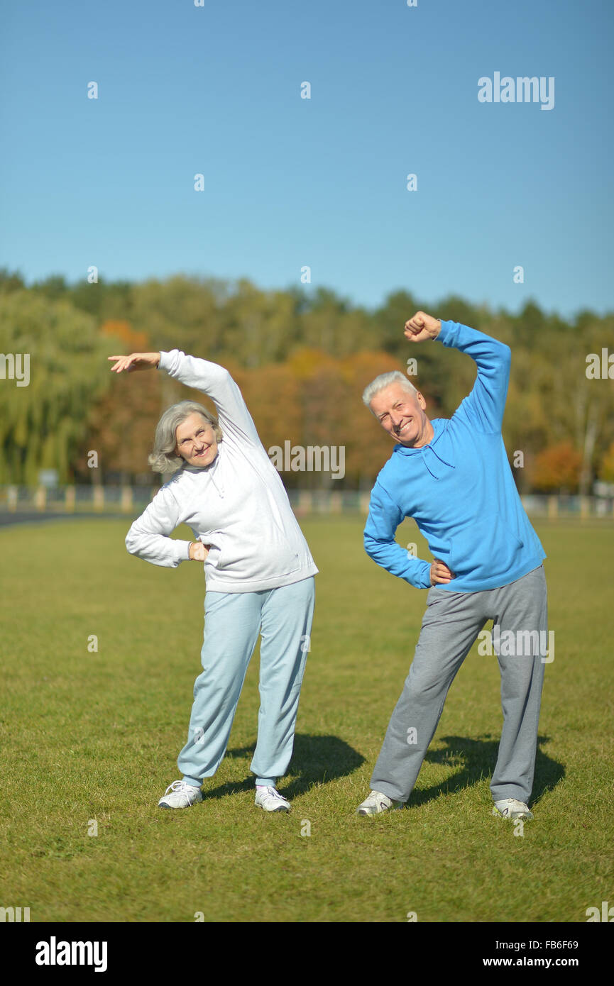 Elderly couple in the park Stock Photo - Alamy