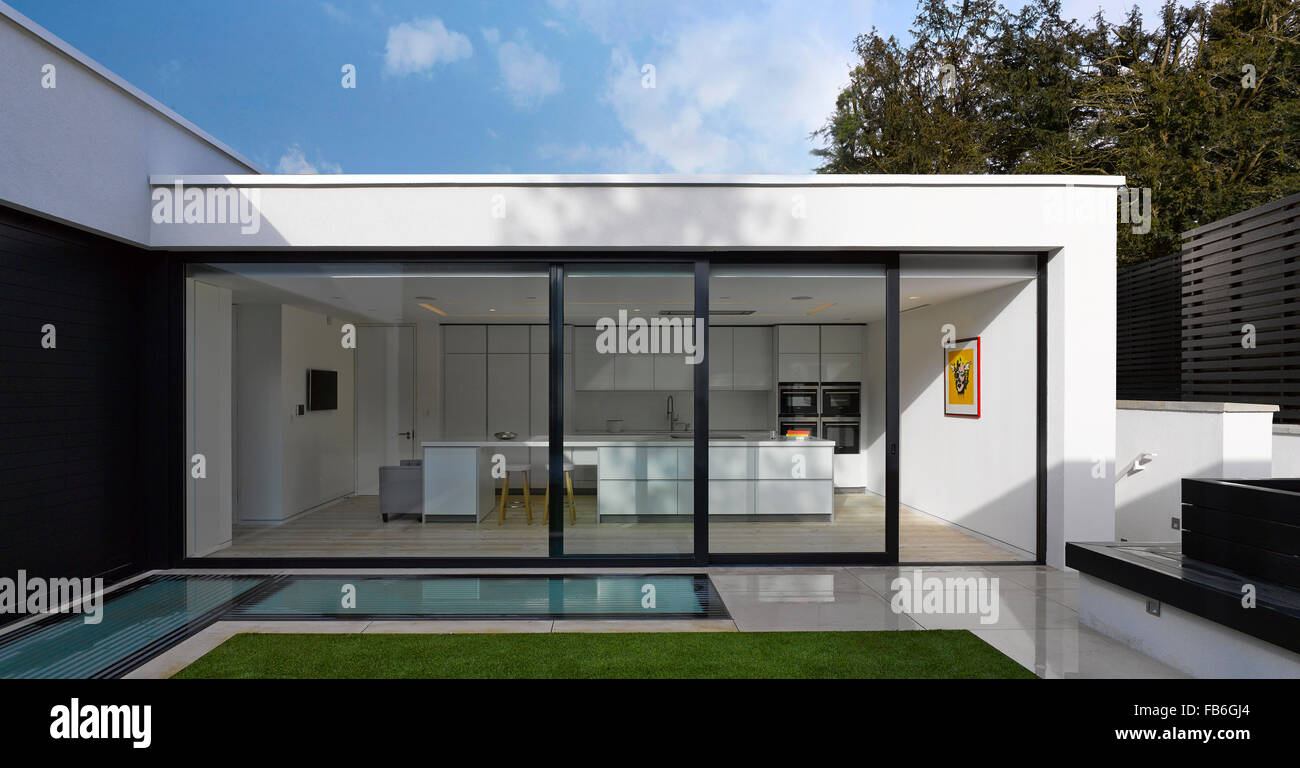 Kitchen view. Courtyard House, London, United Kingdom. Architect
