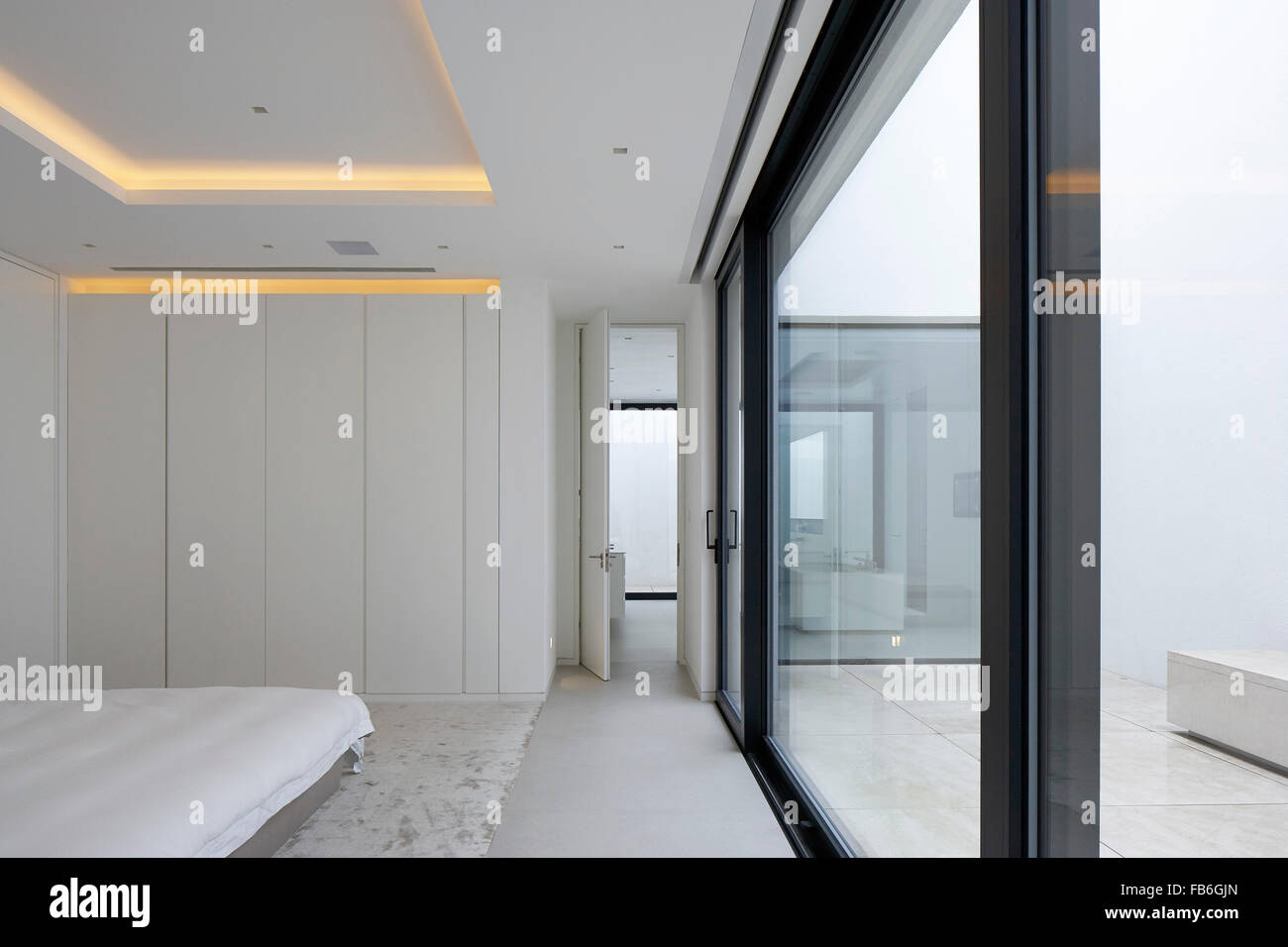 Bedroom. Courtyard House, London, United Kingdom. Architect Canaway