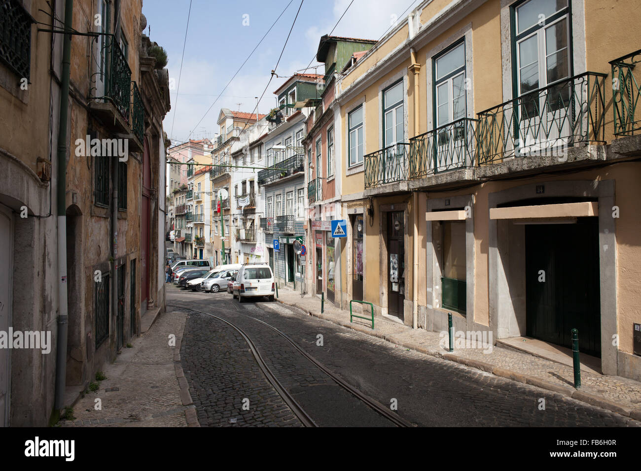 Lisbon in Portugal, street and houses in old quarter of the city Stock Photo
