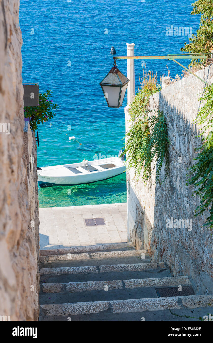 Steps leading down to harbour on the Island of Hvar, part of the Split-Dalmatia County, Croatia, Europe. Stock Photo