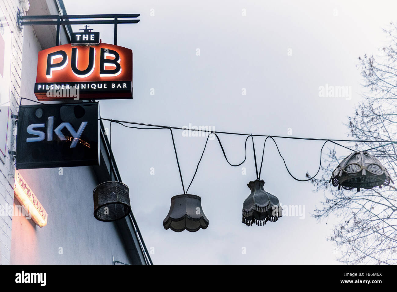 The Pub sign and quirky old lampshades, Berlin Stock Photo