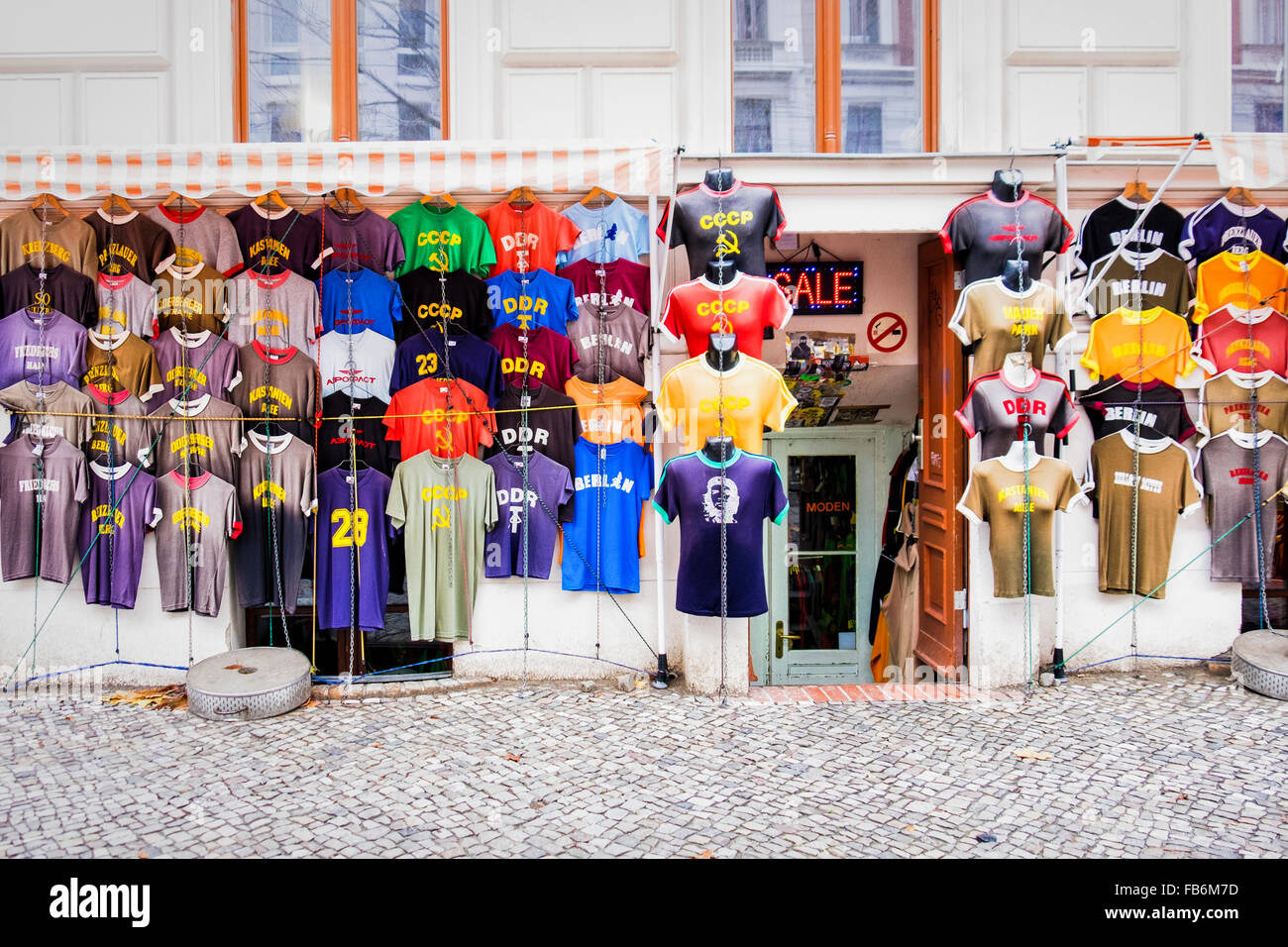 Berlin T-shirt shop. Display of colorful clothing outside store Stock Photo  - Alamy
