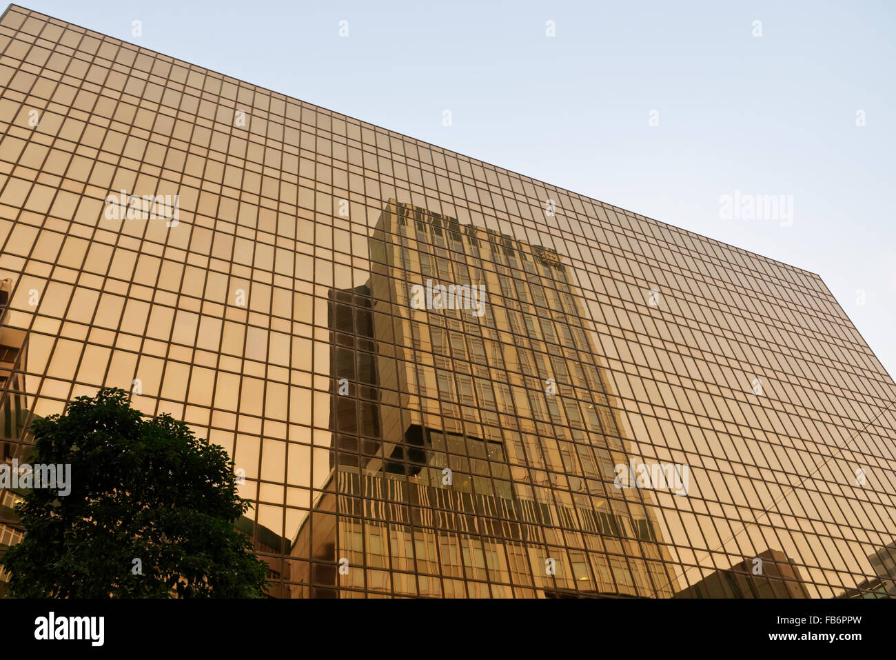 skyscraper reflected in the mirror glass of another building Stock ...