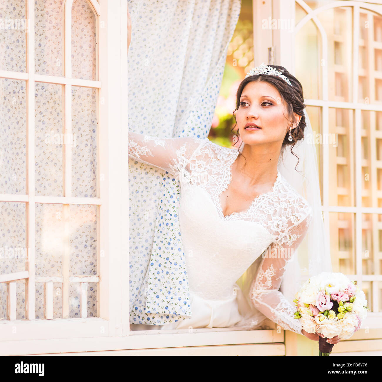 Wedding. Beautiful bride with bouquet Stock Photo - Alamy
