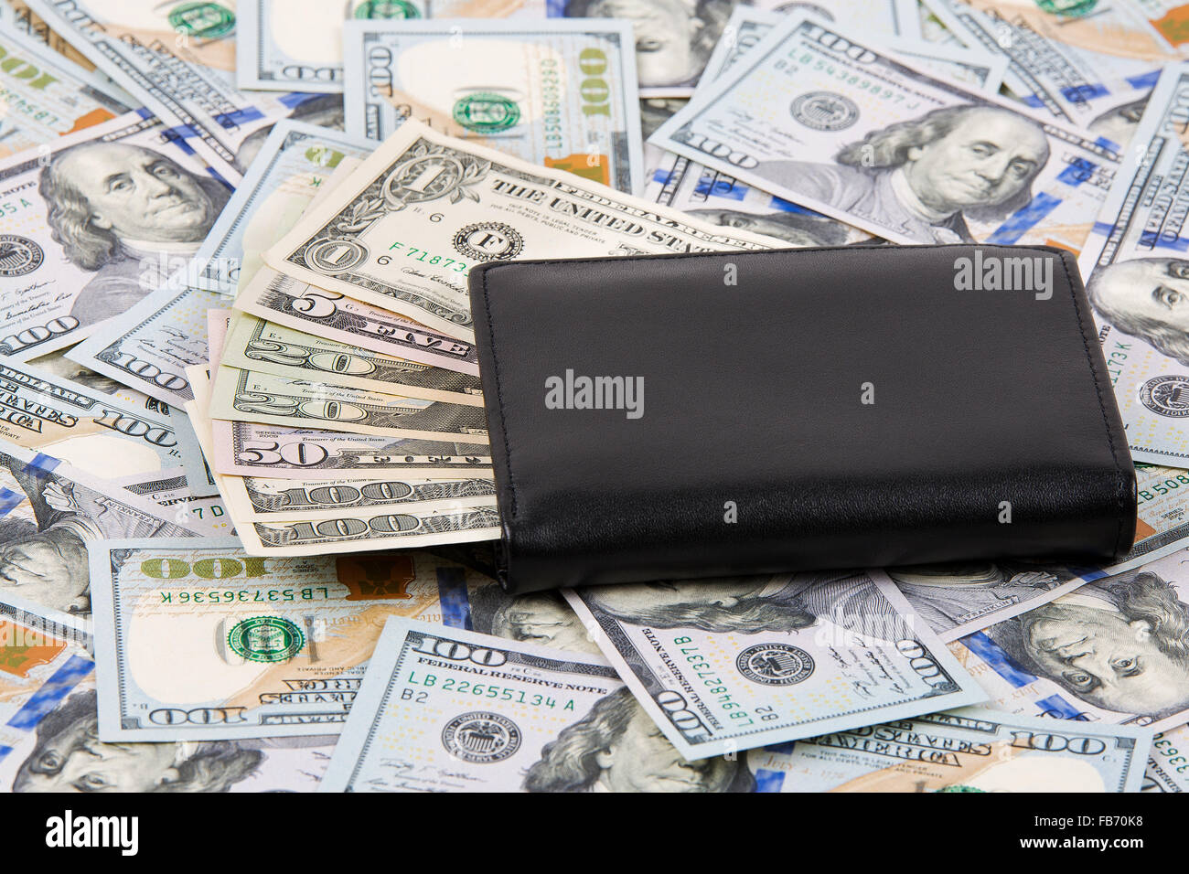 Black wallet with American dollars Stock Photo
