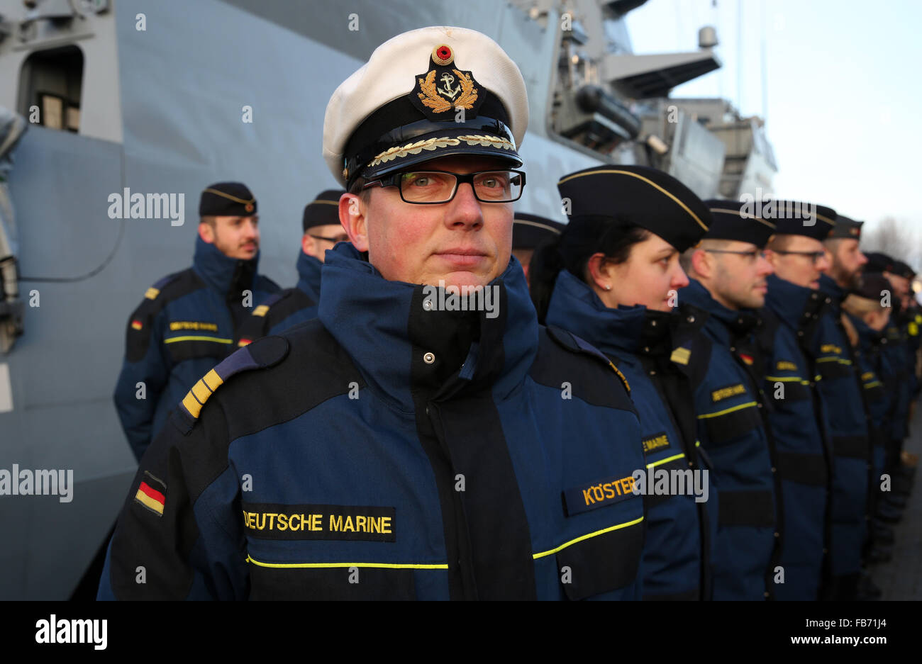39-year-old Corvette Captain Marco Koester, commanding officer of the German corvette 'Ludwigshafen am Rhein', pictured prior to its departure for the European Union operation 'Eunavfor Med' off the Libyan coast, at the German naval base in Warnemuende, Germany, 11 Janaury 2016. The corvette is the first one of its kind to participate in the operation which focuses on the fight against human traffickers and the rescue of refugees in distress at sea. Photo: BERND WUESTNECK/dpa Stock Photo
