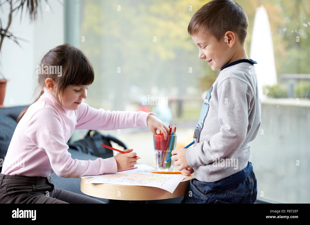 Happy Little Girl And Boy Drawing At Home Stock Photo Alamy Happy Little Girl And Boy Drawing At Home Stock Photo Alamy