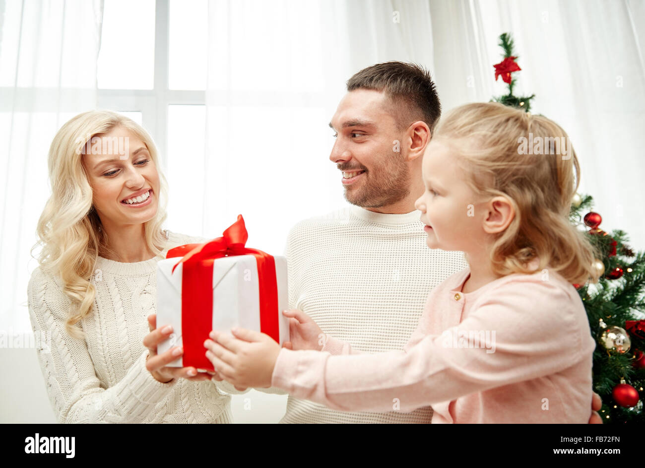 happy family at home with christmas gift box Stock Photo - Alamy