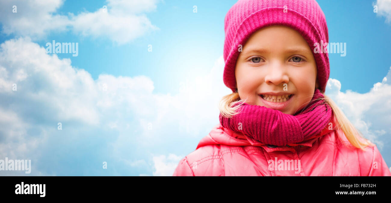 happy beautiful little girl portrait over blue sky Stock Photo - Alamy