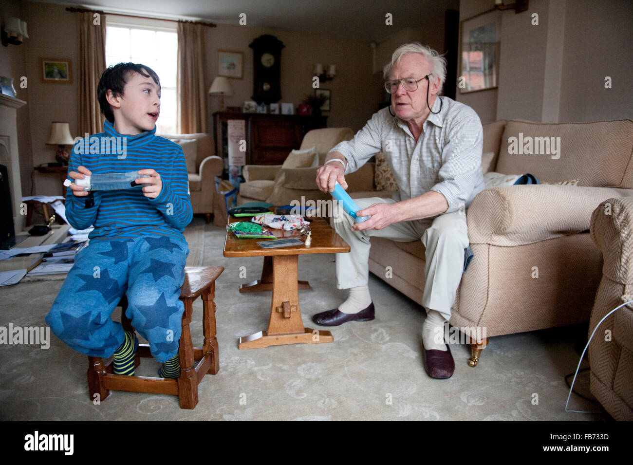 11 Year Old Grandson Playing On The Wii With His Grandfather In North Yorkshire Stock Photo Alamy 11-year-old-grandson-playing-on-the-wii-with-his-grandfather-in-north-yorkshire-stock-photo-alamy