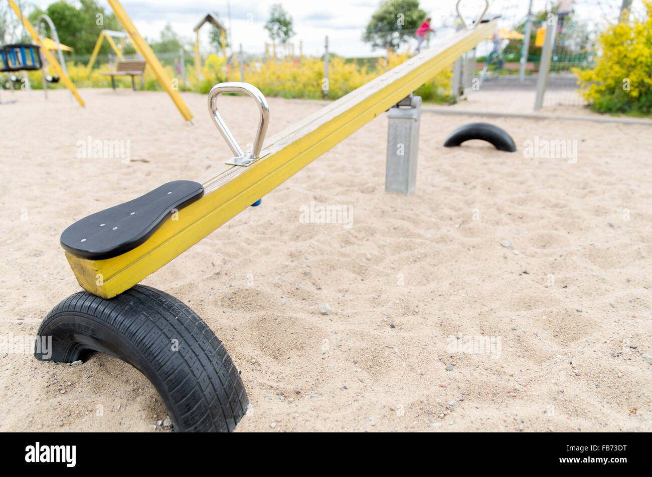 close up of swing or teeterboard on playground Stock Photo