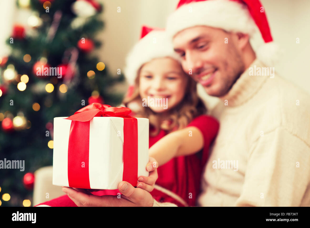 close up of father and daughter with gift box Stock Photo