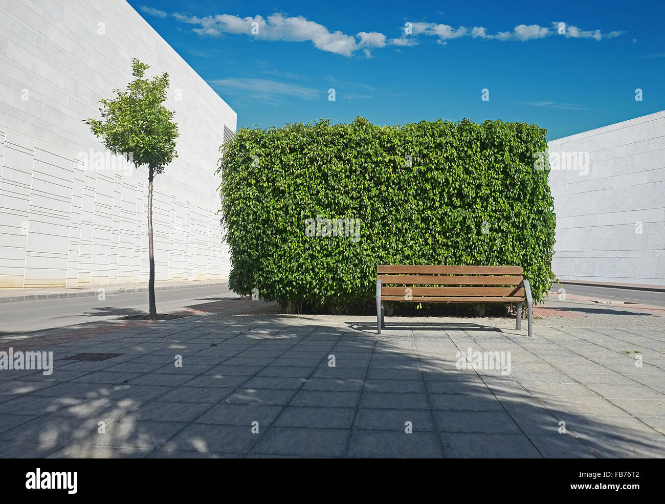 Walls and trees in Spanish village Stock Photo