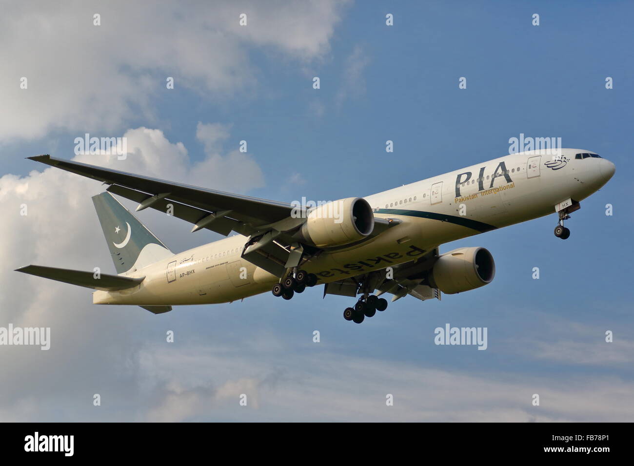 Pakistan International Airlines Boeing 777-240(ER) AP-BHX landing at Heathrow Airport, London Stock Photo