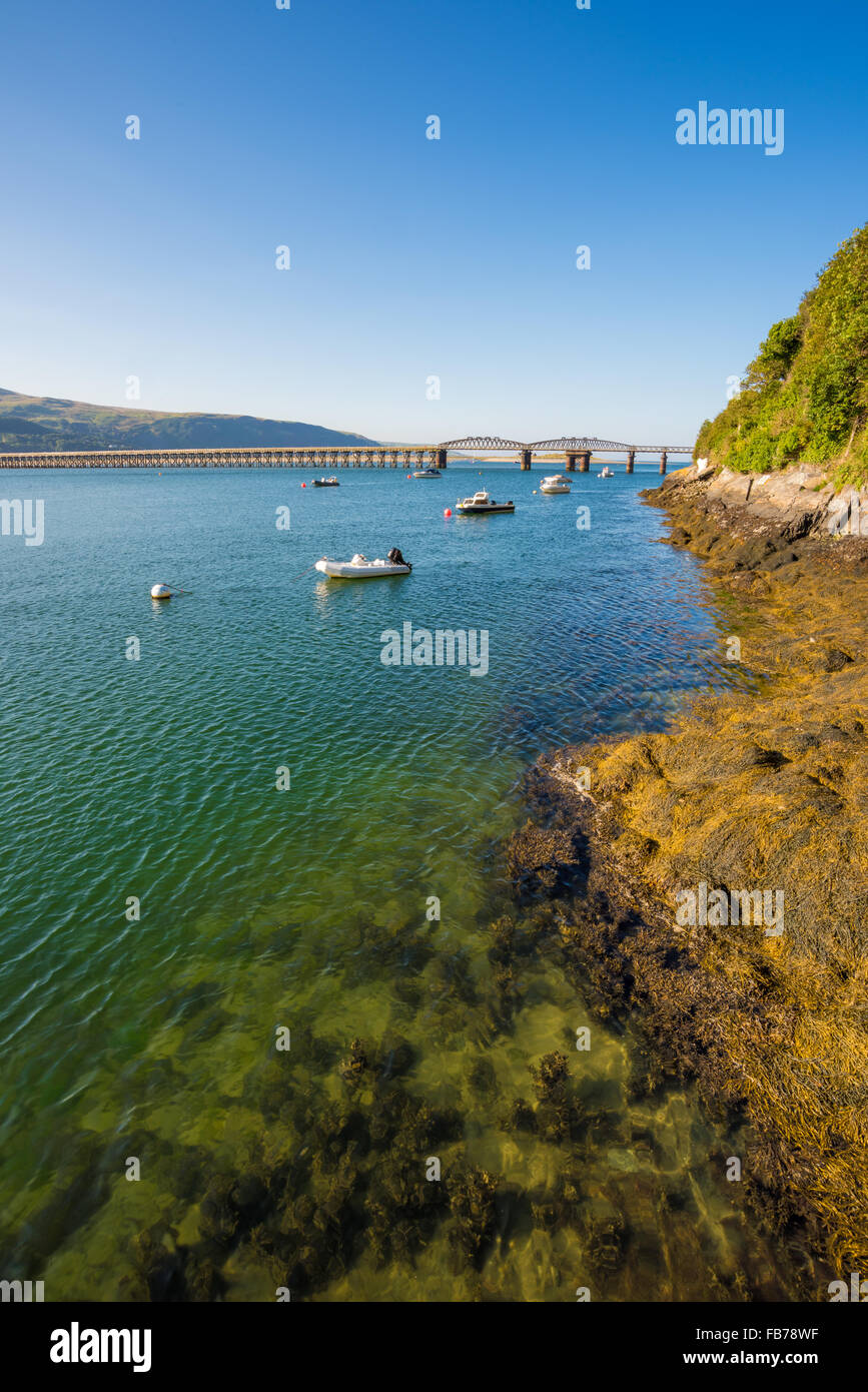 A view across the estuary to Barmouth Viaduct barmouth gwynedd Wales UK Stock Photo