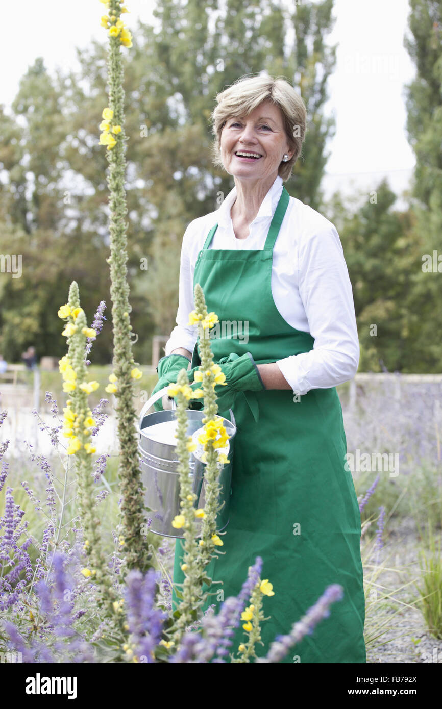 Mature blonde woman smiling hi-res stock photography and images - Alamy