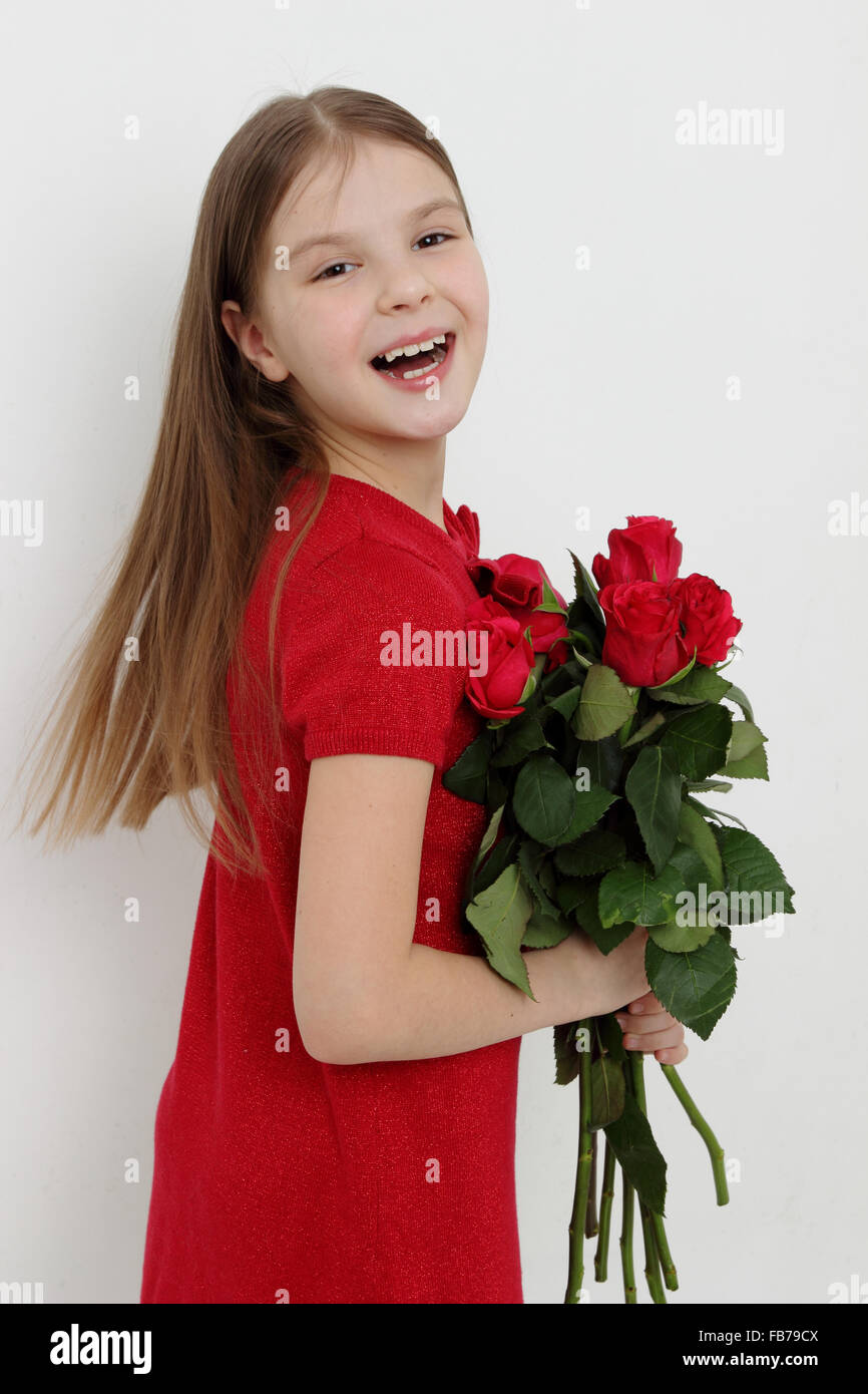 Beautiful little girl red rose hi-res stock photography and images - Alamy