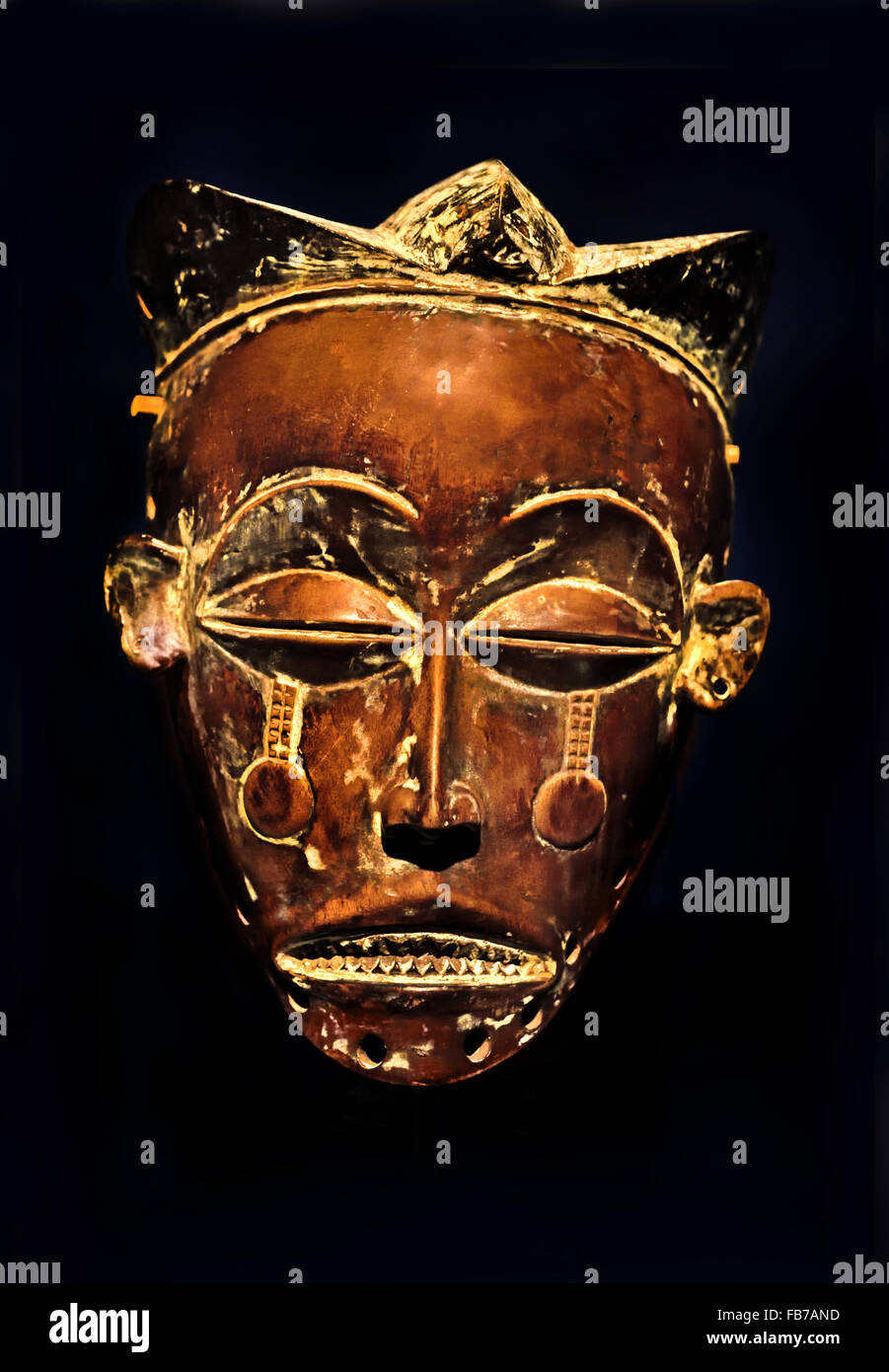 The Mwana Pwo (young woman) mask represents the female ancestor of the Chokwe Century XX  Chokwe (RD Congo) Wood people Africa African Stock Photo