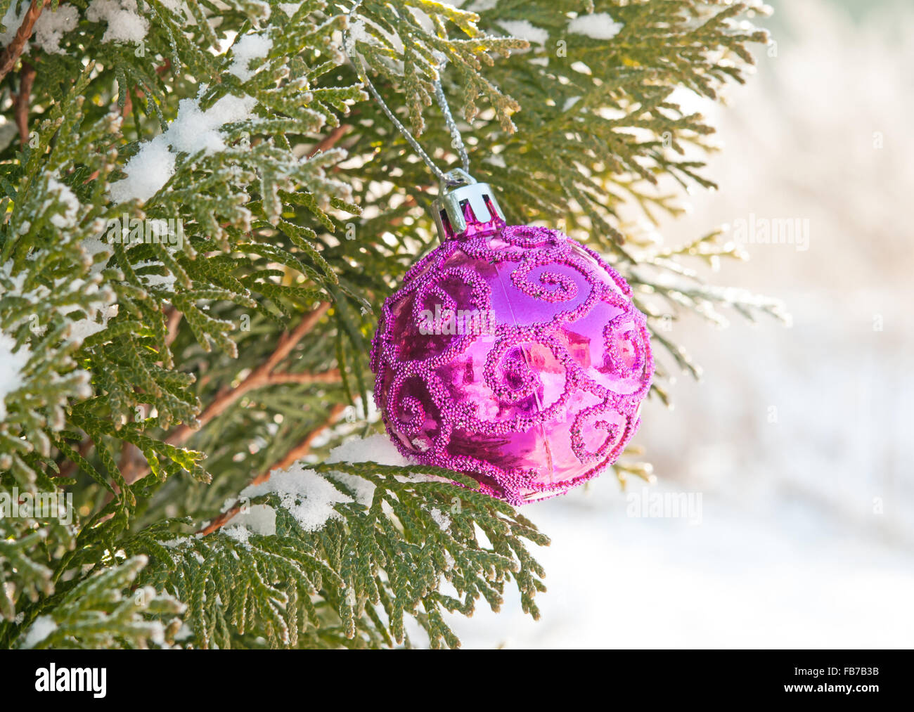 christmas tree with decoration under snow Stock Photo