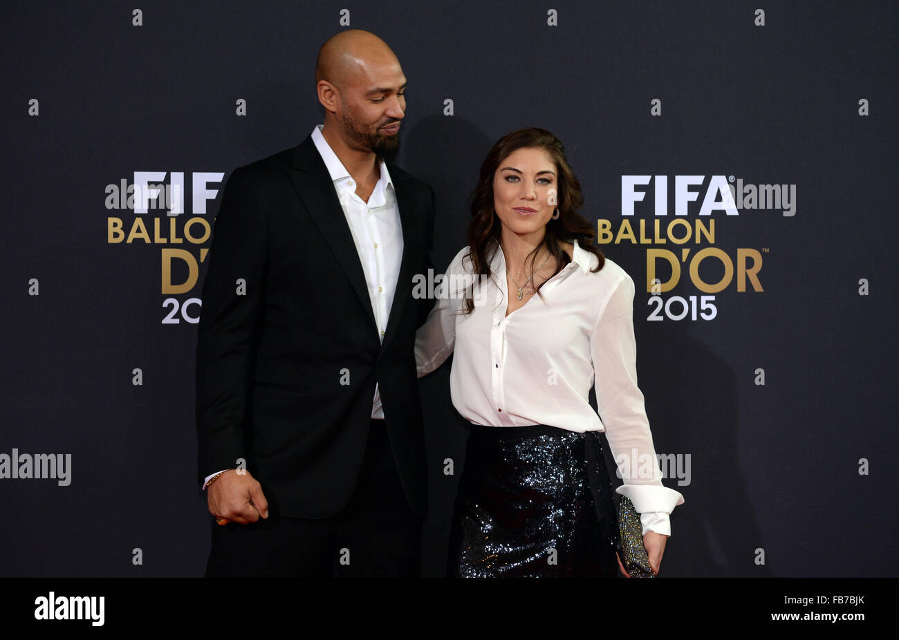 Zurich, Switzerland. 11th Jan, 2016. Hope Amelia Stevens, commonly known by her maiden name, Hope Solo, and her husband Jerramy Stevens arrive for the FIFA Ballon d'Or Gala 2015 held at the Kongresshaus in Zurich, Switzerland, 11 January 2016. Photo: Patrick Seeger/dpa/Alamy Live News Stock Photo