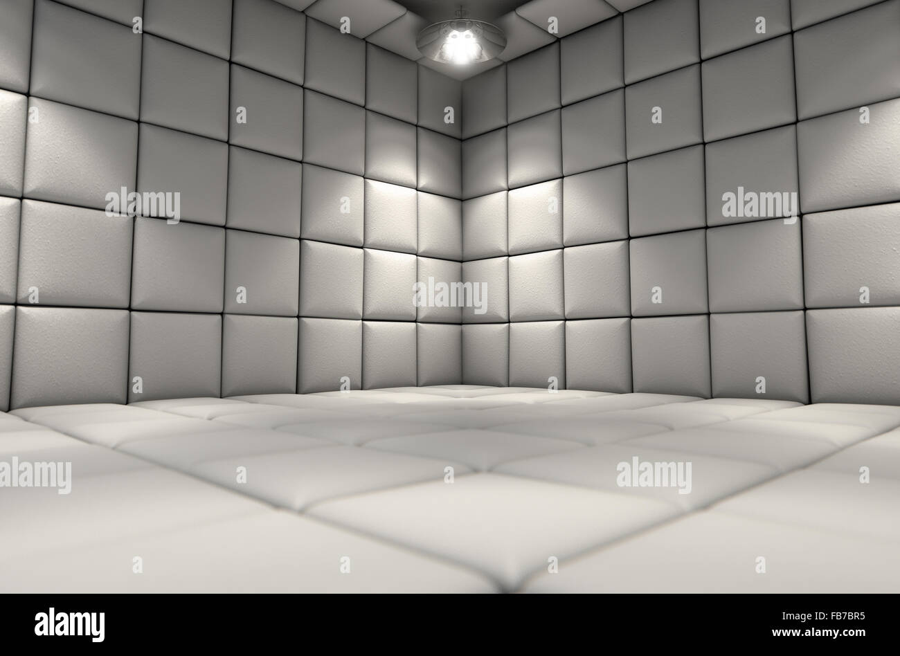 A white padded cell in a mental hospital Stock Photo