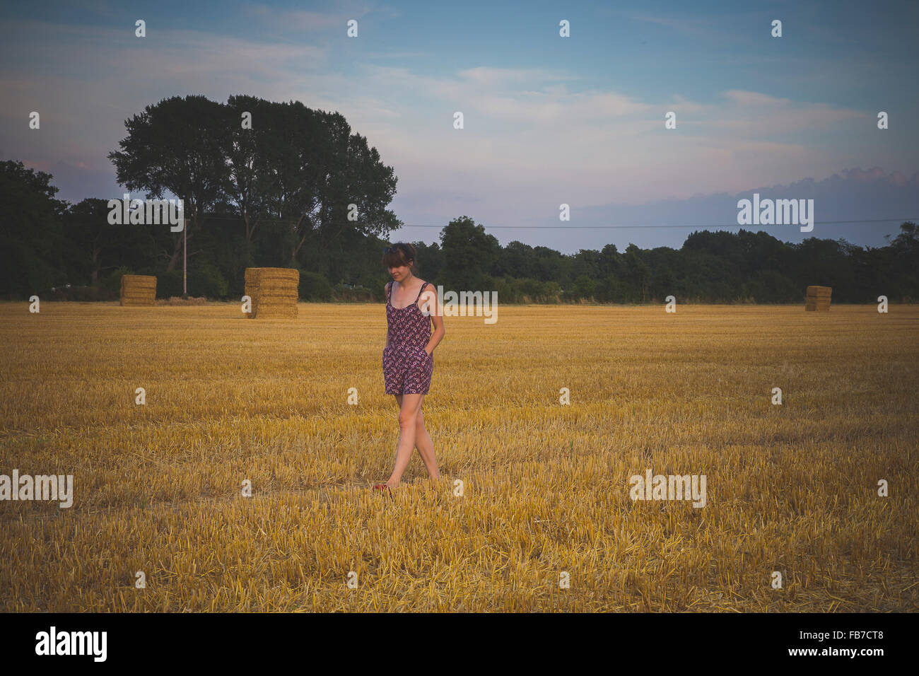 Woman walking farm field hi-res stock photography and images - Alamy