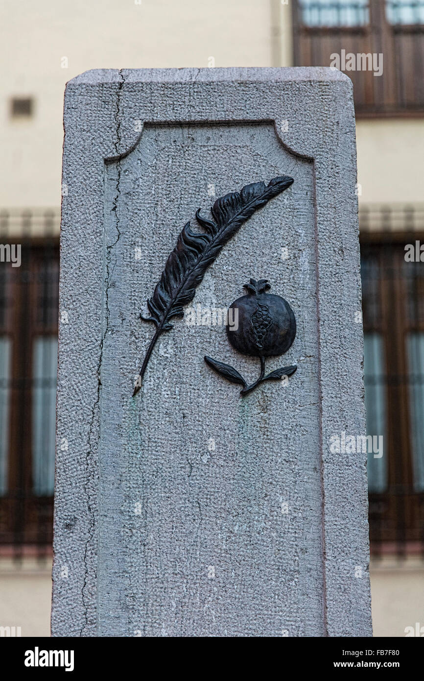 Monument in Granada to journalists who died under the dictatorship of General Franco with the emblem of journalists the feather Stock Photo
