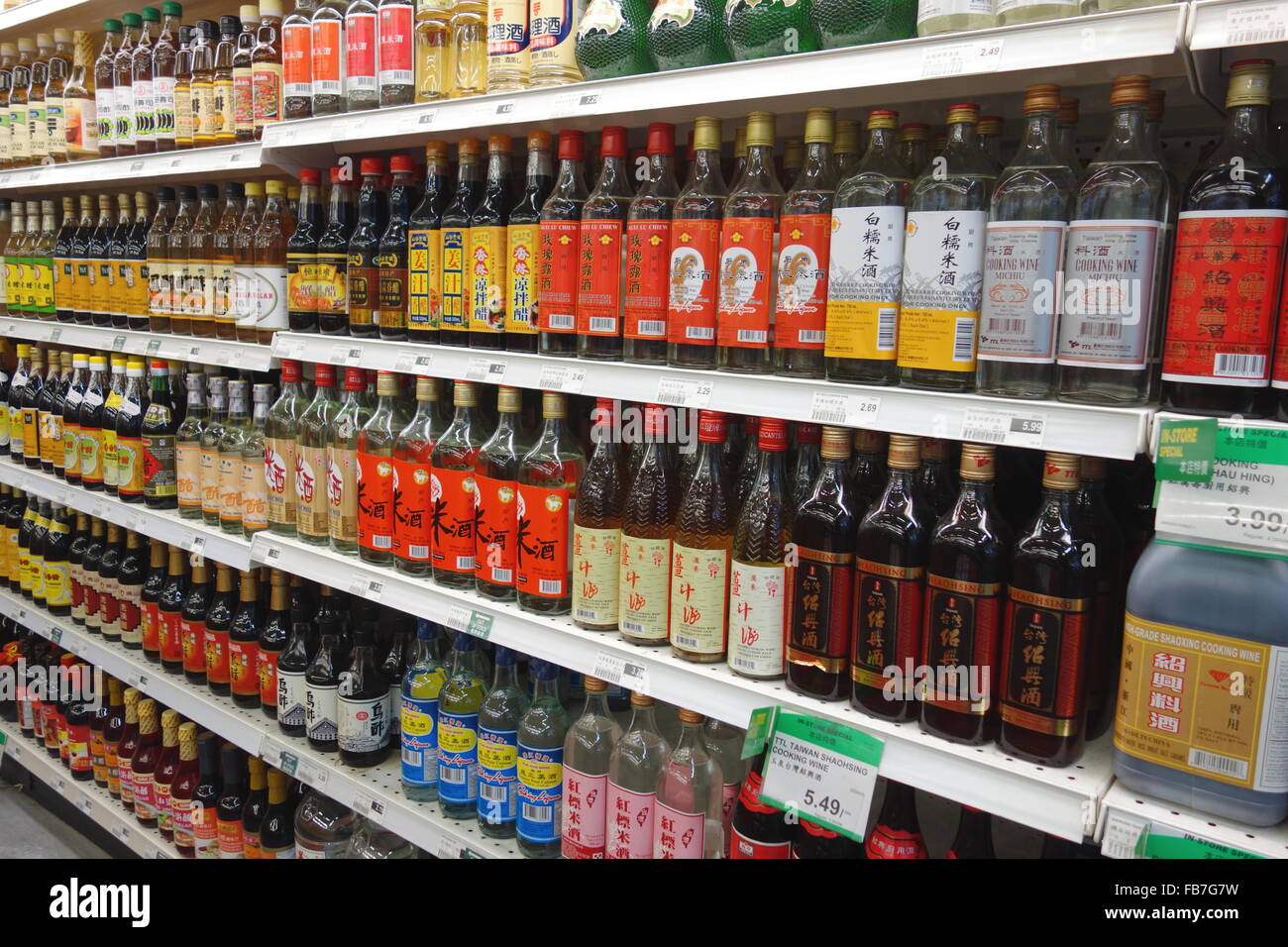 Chinese cooking wines and vinegar bottles at a supermarket in Toronto, Canada Stock Photo