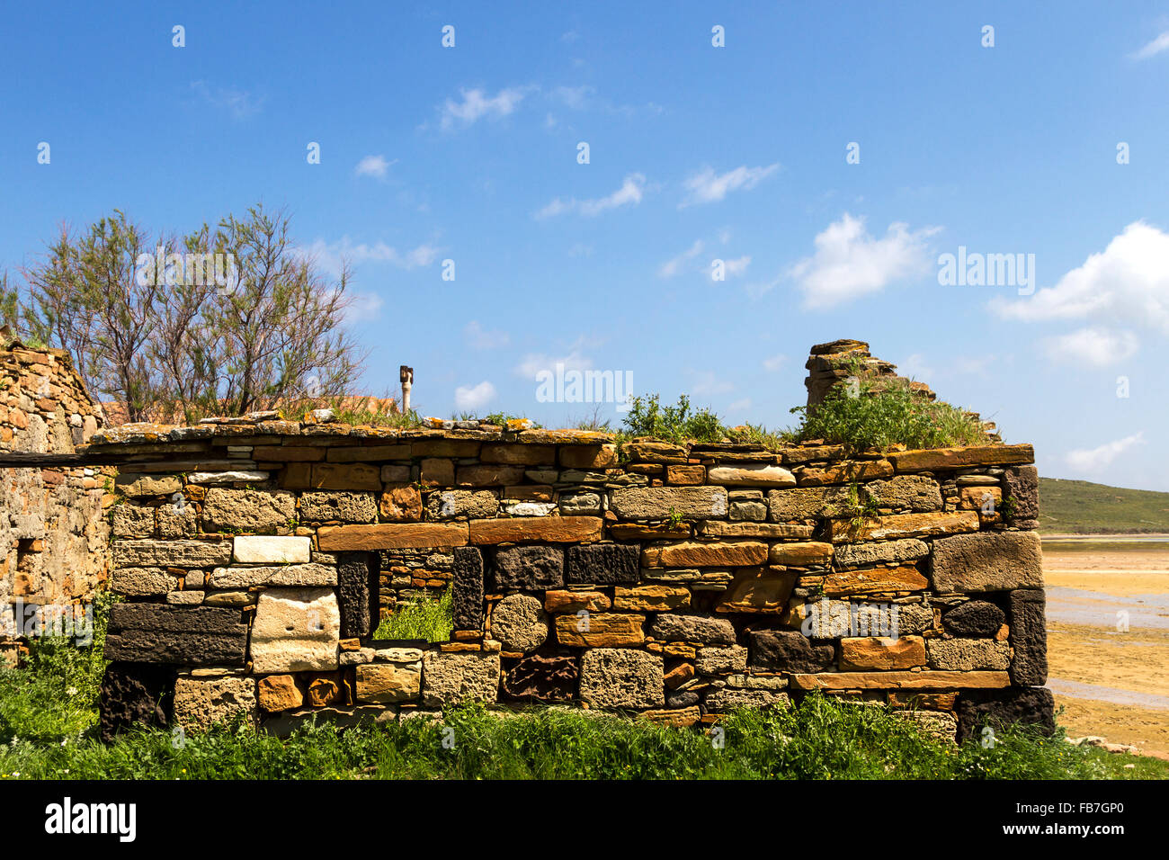 Stone built wall by volcanic stones, in the island of Lemnos, Northern Aegean sea, Greece. Stock Photo