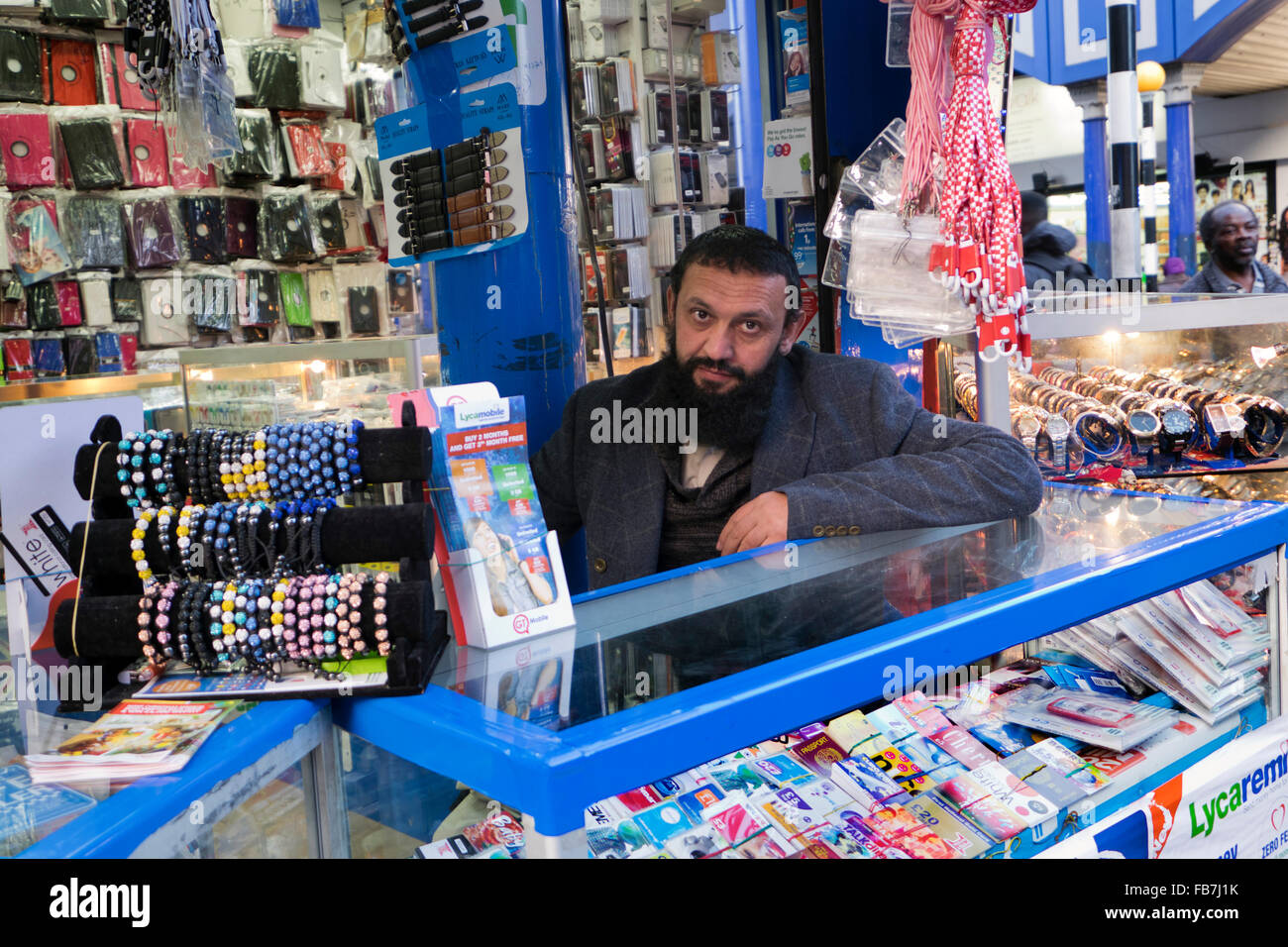 Stand selling mobile phone accessories in Streets of Brixton South London Stock Photo