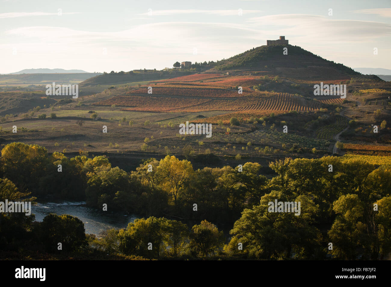 22/10/15 River Ebro and Davalillo castle among vineyards, near San Asensio, La Rioja, Spain Stock Photo