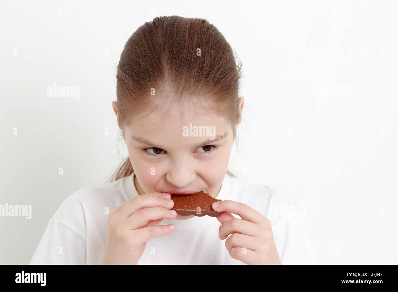 little girl and chocolate Stock Photo