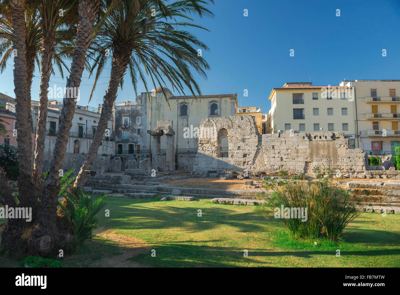 Syracuse Sicily Greek ruins, view of the historic remains of the ancient Greek temple of Apollo in the centre of Ortigia Island, Syracuse, Sicily. Stock Photo